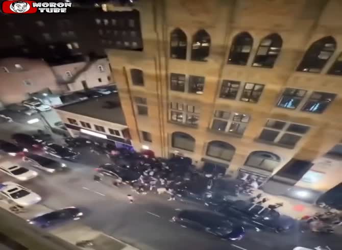 Video :A bottle is thrown from a rooftop by a bastard